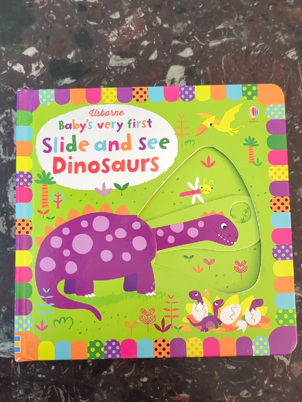 Usborne -Slide and See Dinosaurs Board Book - Purple and Green